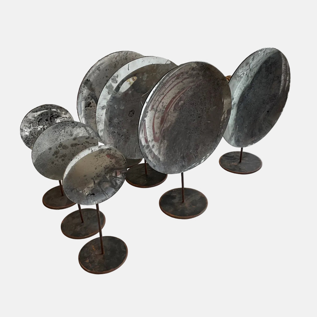 Round Metal Reflectors on Iron Stands